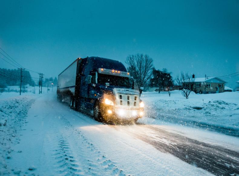 blizzard on the road during a cold winter evening 2024 09 16 23 34 31 utc min