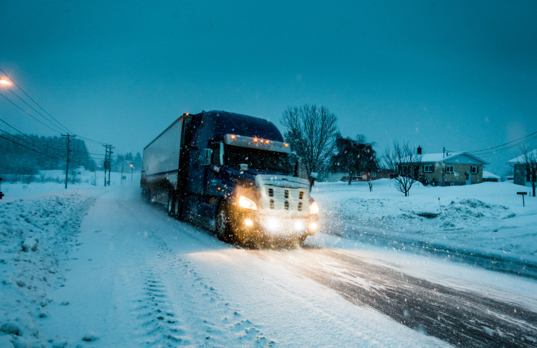 blizzard on the road during a cold winter evening 2024 09 16 23 34 31 utc min